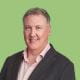 A photo of new ICAEW president Derek Blair on a green background